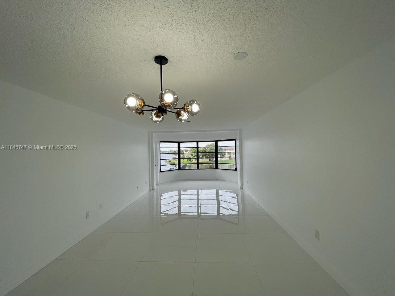 Completely RENOVATED waterfront CORNER UNIT. Porcelain floors throughout. NEW full bathroom tastefully renovated with shower. NEW light fixtures. As soon as you walk in you will observe the peaceful & tranquil water views. Amazing views from master bedroom. White kitchen with granite counter tops, NEW stainless steal appliances. This unit is so bright! Completely gated community with remote access. Plenty of guest parking. Come with your suitcase and enjoy this gorgeous renovation! BRAND NEW washers & dryers on each floor. Elevator available. Community pool & Clubhouse. Water is included. Laundry room in all 3 floors. Call for a private showing! 10 MINS FROM BEACHES & 5 MINS FROM AVENTURA MALL >>AVAILABLE TO MOVE IN 10/1/2025