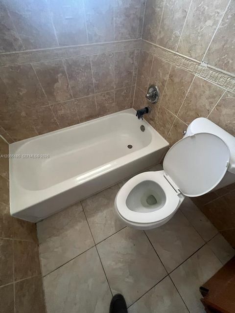 Tiny photo for 606 SW 80th Ter #1, North Lauderdale, FL 33068 (MLS # A12005185)
