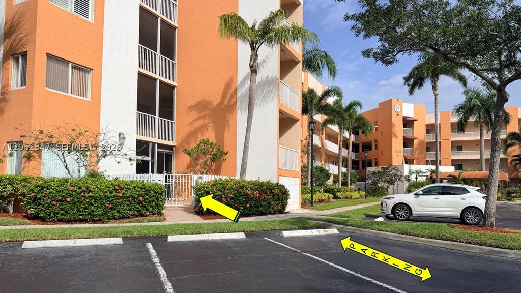 Photo of 7735 Yardley Dr #101, Tamarac, FL 33321 (MLS # A12052347)