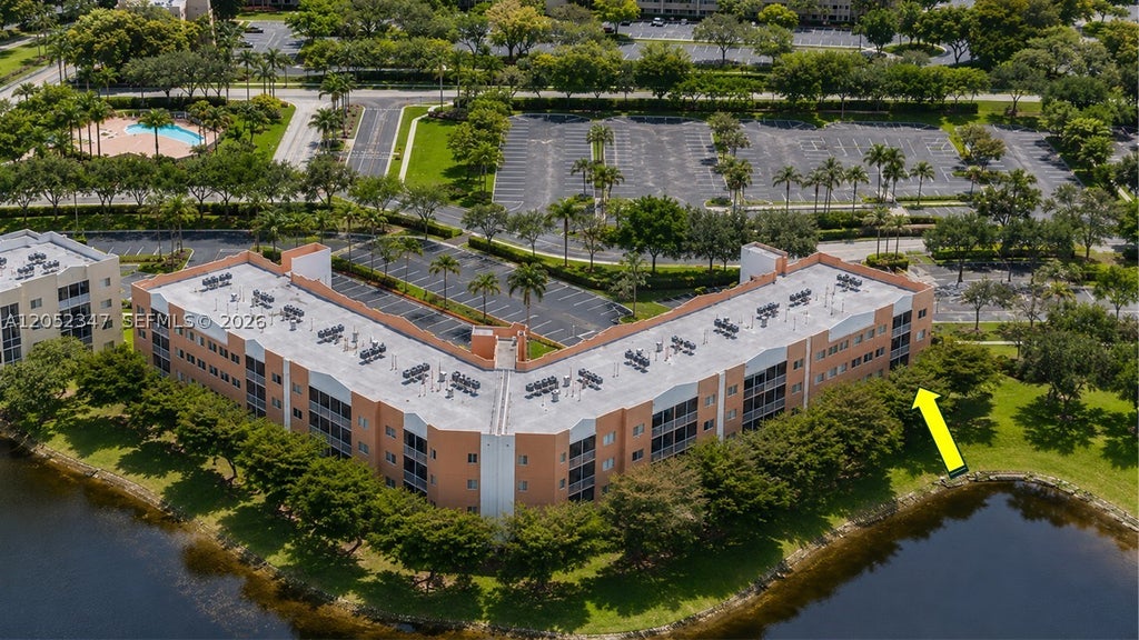 Photo of 7735 Yardley Dr #101, Tamarac, FL 33321 (MLS # A12052347)