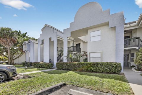 Photo of 430 SW 113th Way #430, Pembroke Pines, FL 33025 (MLS # A11972422)