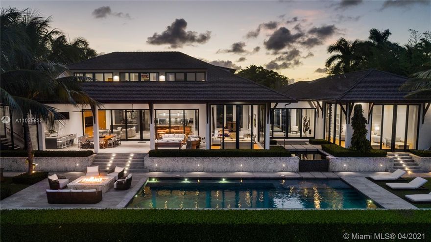 Luxury has been elevated to a new level with this stunning property situated on 140 feet of waterline in the coveted Old Cutler Bay neighborhood. This well-appointed home designed by Florida architect, Cesar Molina, features 6 Bedrooms, 7.5 baths along with bright and airy indoor and outdoor living spaces. The kitchen is appointed with high-end appliances, quartz countertops and custom Mia Cucina millwork situated in the spacious family room with a beautiful wine cellar and wet bar. The master suite overlooks the open water and features a custom his and her walk-in closet by Mia Cucina. Enjoy the a/c 2-car garage, the dreamy home theatre, home office, full gym and a stunning pool area with a covered summer kitchen, cabana bath, gas fire pit, whole-house generator and lush landscaping.