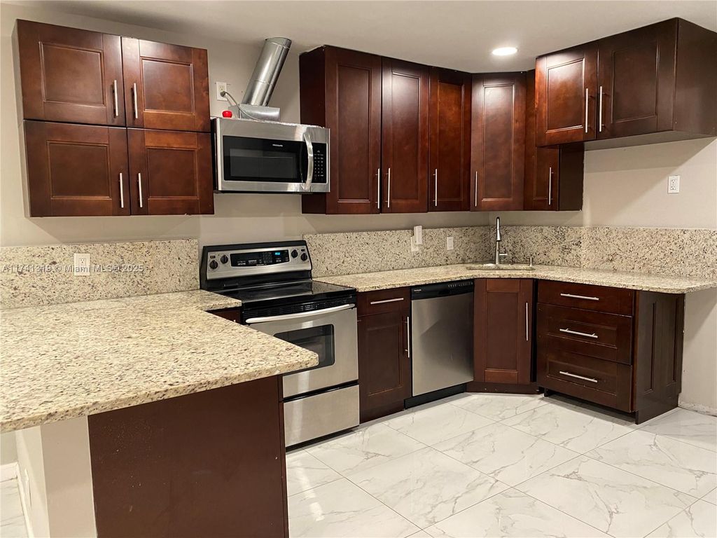 Photo of 7761 NW 42nd Pl #2, Coral Springs, FL 33065 (MLS # A11741319)