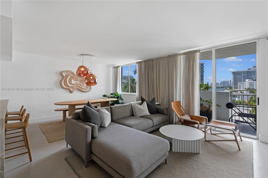 Stunning condo with water views in the heart of Miami Beach – between Sunset Harbour and Lincoln Road! This oversized 2BR/2BA (originally configured as 3BR) offers 1,070 SQF of luxury living. Fully renovated in 2024, with high-end fixtures, finishes, and microcement floors. Chef’s kitchen, breakfast bar, and formal dining area – with quartzite countertops, smart integrated appliances, and hidden storage – make the space ideal for entertaining. Two large private balconies and oversized windows offer breathtaking water views. Unit features custom millwork, in-unit W/D, central A/C, and 2 parking spots. This boutique condo building offers a heated pool, hot tub, gym, and common room. Option to purchase fully-furnished, with designer homeware and decor – just bring your suitcase!