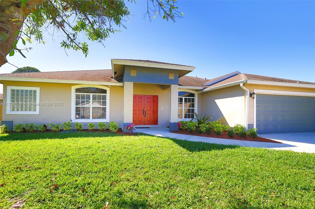 Photo of 372 SW Dagget Ave, Port Saint Lucie, FL 34953 (MLS # A11336229)