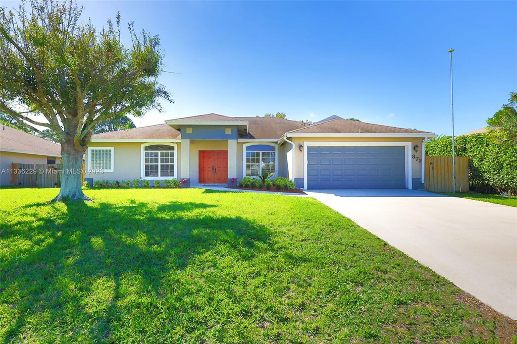 Photo of 372 SW Dagget Ave, Port Saint Lucie, FL 34953 (MLS # A11336229)