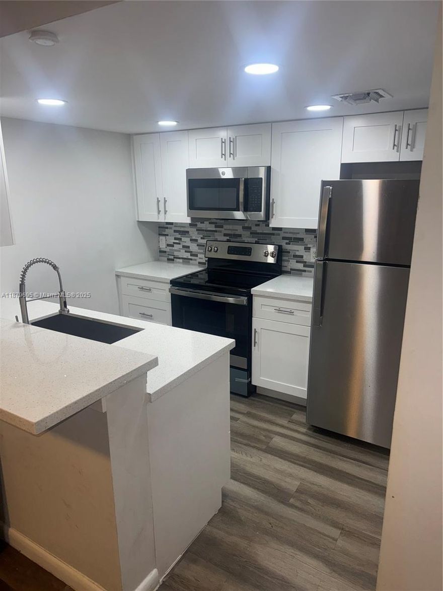 Beautiful fully renovated condo located in the heart of Coral Springs. Upgraded kitchen w/stainless steel appliances, updated bathrooms and vinyl floors throughout the home. Perfect for first time homeowners or investors. Unit was leased at $2300 per month from previous tenant. Located on the 1st floor with plenty of dining and living room space. Storage space inside and outside of the unit. This condo is a must see won't LAST LONG!!!!