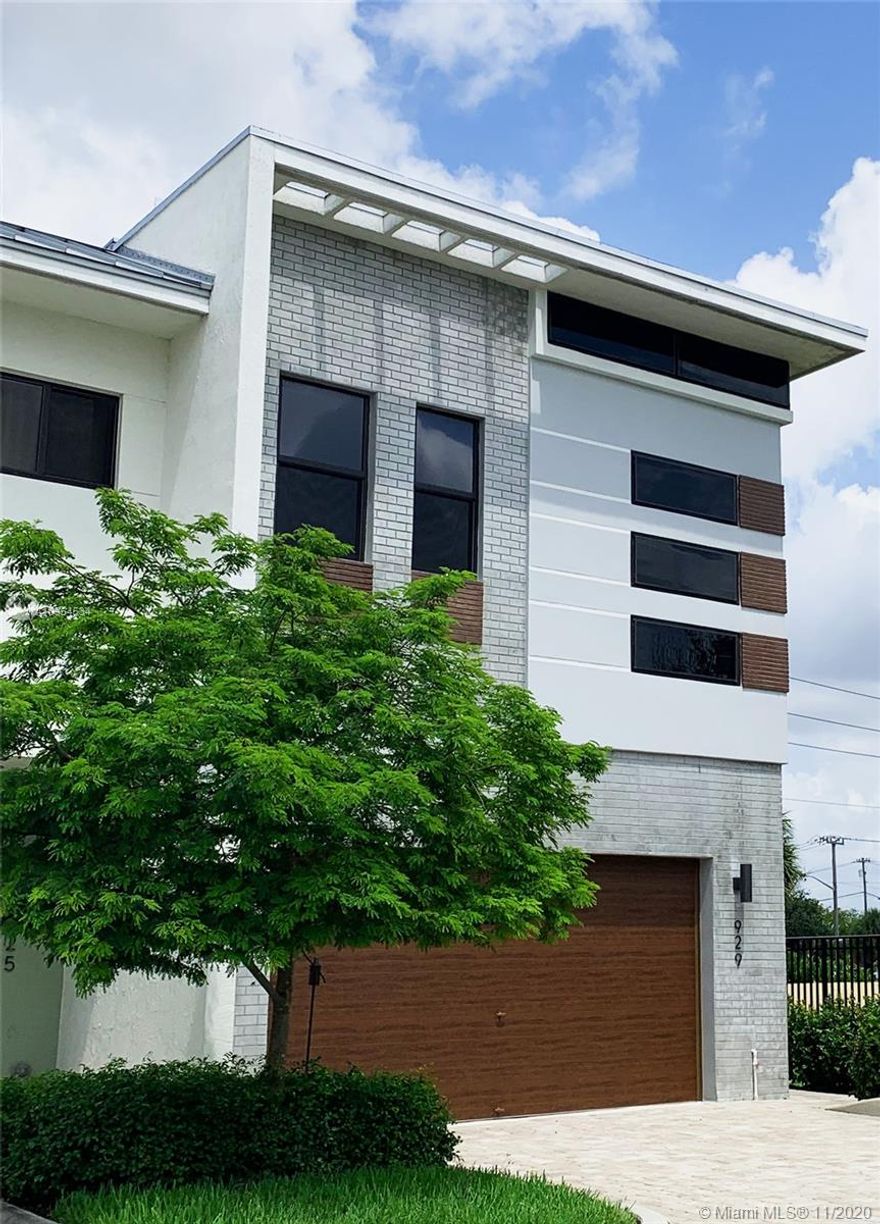 Beautiful, modern townhouse located in the gated community, Strata at Plantation. This Thorin model is a corner unit with a private side entrance. It has 3 bedrooms, loft area, patio that is accessible from the main living area, high ceilings, impact windows which are tinted for energy efficiency, Nest thermostat and security cameras. Contemporary, high-quality, state-of-the art designer accents, custom window treatments and unique light fixtures flow throughout the unit.  The kitchen has stainless steel appliances, European cabinetry and a signature island. First floor has ceramic floors. Wooden floors run through the staircase and the upper level. Master bedroom has 2 custom walk-in closets, a spa bathroom and a balcony. Clubhouse amenities include a pool, gym and a billiard room.