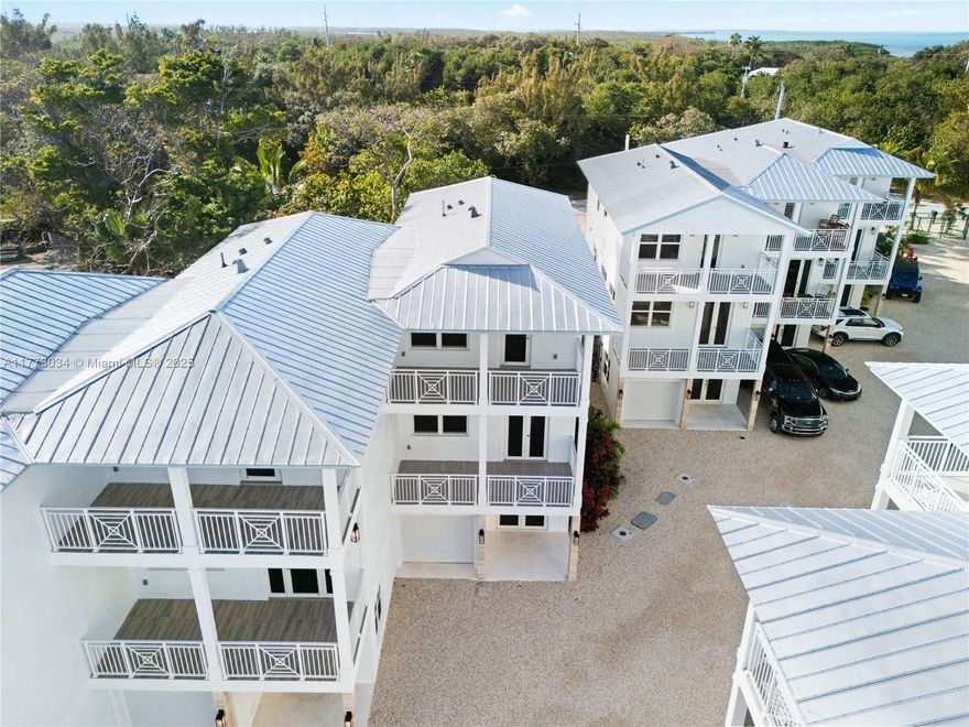 Peaceful Palms, a newly developed gated community offering 15 exclusive high-end townhomes in the heart of the Florida Keys. This oceanfront retreat boasts breathtaking views of the renowned Sandbar and Alligator Reef Lighthouse, providing the perfect blend of luxury, relaxation, and investment potential. Each three-bedroom, three-bathroom townhome is thoughtfully designed with expansive balconies on both the second and third floors, a spacious garage, and pet-friendly accommodations. Peaceful Palms is designed to accommodate weekly rentals with the proper permitting, offering an incredible opportunity for investors. With the possibility of new building permits becoming unavailable in the Florida Keys, now is the time to secure your place in this sought-after destination.