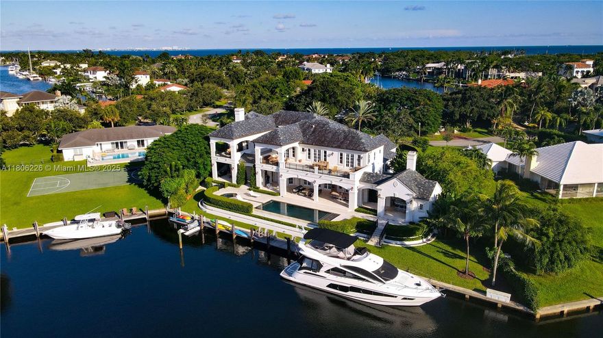 Experience unparalleled elegance in this breathtaking estate located in Old Cutler Bay. Designed by architect Ramon Pacheco & nestled within an exclusive gated community, this masterpiece offers stunning bay views. Fully updated in 2015, the home features a grand foyer, a chef’s kitchen with top-tier appliances, & elegant dining spaces overlooking a spectacular infinity pool.
The luxurious master suite with a fireplace provides a serene retreat. Additional highlights include a theater, four-car garage, 100-foot dock with direct ocean access, & a full-house generator.
Recent enhancements to the seawall, deck, & floating docks-completed by a respected local marine contractor- further elevate the estate, combining structural refinements with cosmetic upgrades for lasting beauty & value.