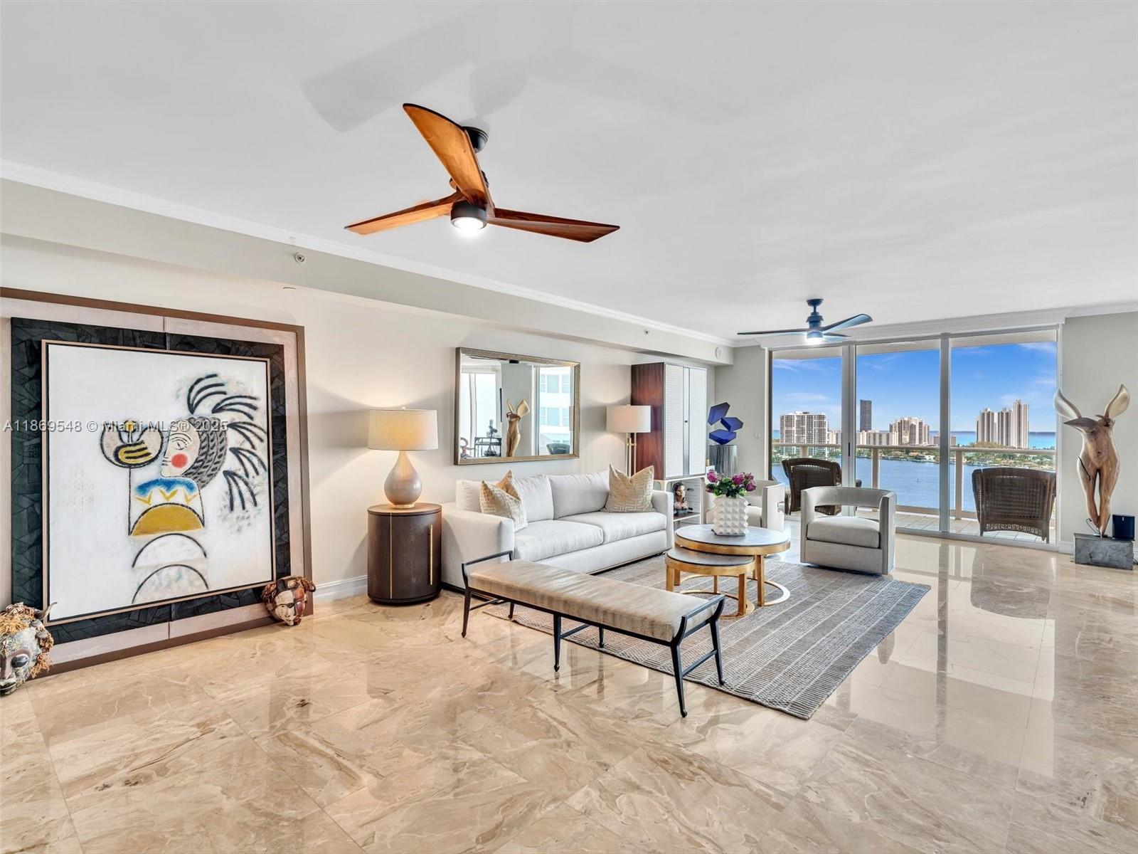 Unfurnished, beautiful waterfront condo is immaculate, move-in condition! It has an elegant dining room that flows into the adjacent living room, creating an area ideally suited for effortless entertaining with unobstructed views of the intercoastal. 3 bedrooms, 3.5 bath, plus a media room. Marble floors throughout, custom-built closets. A true luxury condo & must-see!