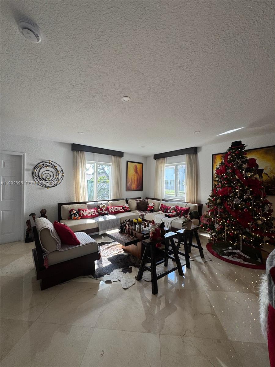 View photos, virtual tours, details... 10973 NW 53rd Ln