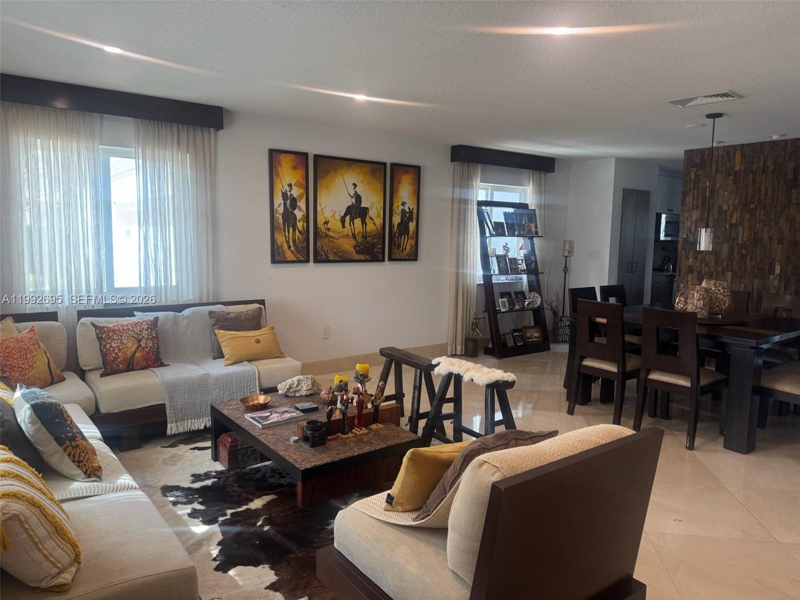 View photos, virtual tours, details... 10973 NW 53rd Ln