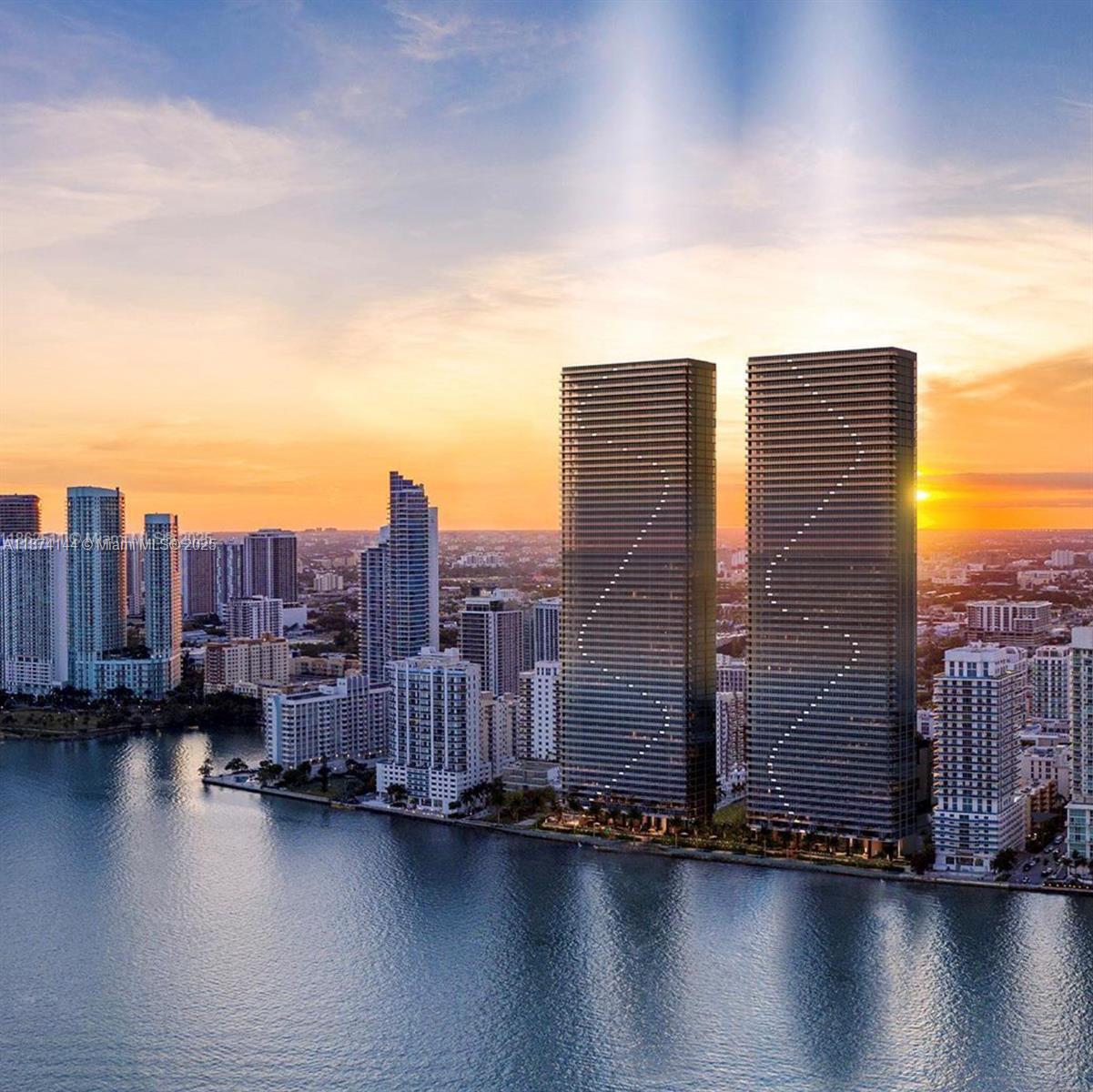 Live the ultimate waterfront lifestyle at Aria Reserve. Brand-new 2 bed + den, 2.5 bath residence on the 46th floor with 1,799 sqft, move-in ready with custom upgrades. Private elevator foyer, flow-through layout, 10-ft floor-to-ceiling glass walls, and expansive terrace with panoramic views of Biscayne Bay, Miami Beach skyline, and the Atlantic Ocean. Den can serve as a 3rd bedroom or office.
Includes 2 assigned garage spaces.
Resort-style amenities: semi-Olympic pool, fitness center, spa, wine lounge, tennis & paddle courts, mini-golf, kids’ play area, business center, party rooms, concierge & valet. Pet friendly with very low HOA. Perfect Edgewater location, minutes from Wynwood, Design District, Brickell & Miami Beach.