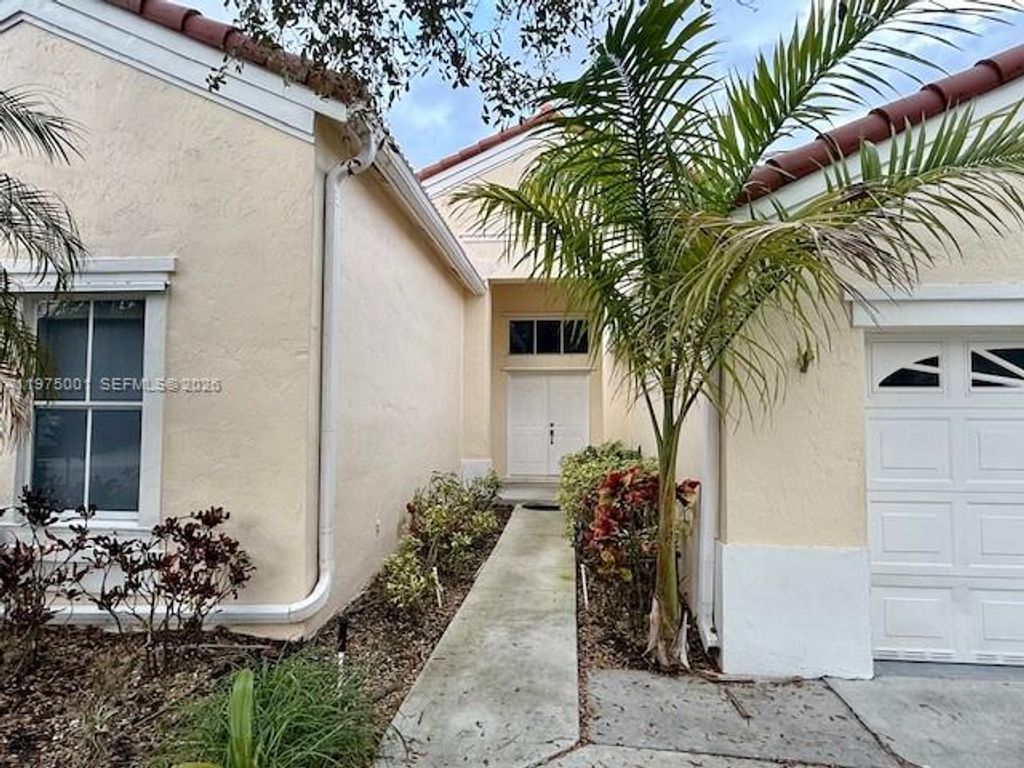 Photo of 622 Carrington Ln #622, Weston, FL 33326 (MLS # A11975001)