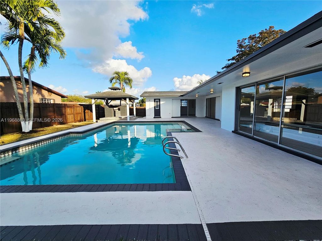 Photo of 11101 NW 19th St, Pembroke Pines, FL 33026 (MLS # A11968863)