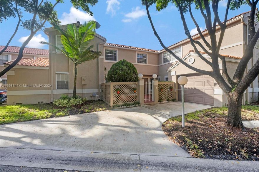 Do you want GREAT SCHOOLS in a GATED COMMUNITY with RESORT STYLE AMENITIES & a BEAUTIFUL HOUSE to live in?  BRAND NEW ROOF  AND NO POLYBUTYLENE PIPES! UPDATED, SPACIOUS 2 STORY TOWNHOUSE W FULL GARAGE, LIVING, DINING, FAMILY ROOM, ALL OPEN KITCHEN, ENORMOUS PRIMARY BDRM & BATH.  LIGHT & BRIGHT, NEUTRAL COLORS THROUGHOUT, NEW FRONT DOOS,  W BRUSHED NICKEL HARDWARE, MEDCO KEY LOCK FOR ALL DOORS, KITCHEN PANTRY AND UNDER SINK WATER FILTER, NEW WATER HEATER, LARGE CAPACITY WASHER/DRYER, HUGE STORAGE AREA UNDER THE STAIRS W LIGHT & ELECTRIC, ERGONOMIC BRUSHED NICKEL DOOR HANDLES.  MINUTES TO SAWGRASS EXPY, HARD ROCK, NOVA SOUTHEASTERN, CLOSE TO BEACH, AIRPORT, GREAT SHOPPING, HOSPITALS, A WONDERFUL LIFESTYLE AWAITS.