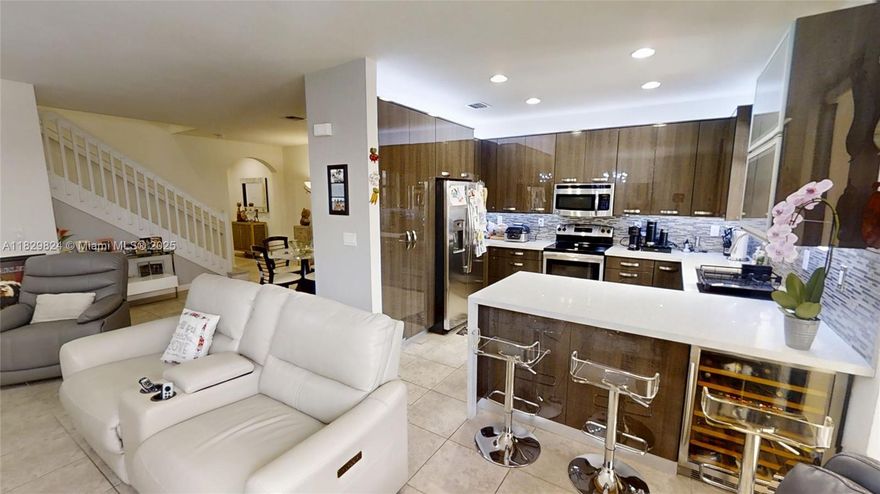 Two Story 3/2/1 townhouse on a quiet lake view street. Wonderfully maintained 2016 construction & upgrades to kitchen, flooring, & patio. Master bedroom boasts tray style high ceilings & oversized walk-in closet. Master bath dual sinks + separate tub & shower. Open layout 1st floor with guest bath & room for formal dining, living room & kitchen entertaining areas. Wide-spacious staircase upstairs to split-plan master separated from 2nd & 3rd bedrooms & washer/dryer closet. Covered back patio with ceiling fans & plenty of sun area to garden & grill. Lake & sunset views in front of home. Resident pool at gated clubhouse overlooking scenic lake. 2 car garage plus space to park 2-3 vehicles in driveway. HOA covers landscaping & funding for reserves. Impact glass & shutters. Tile roof