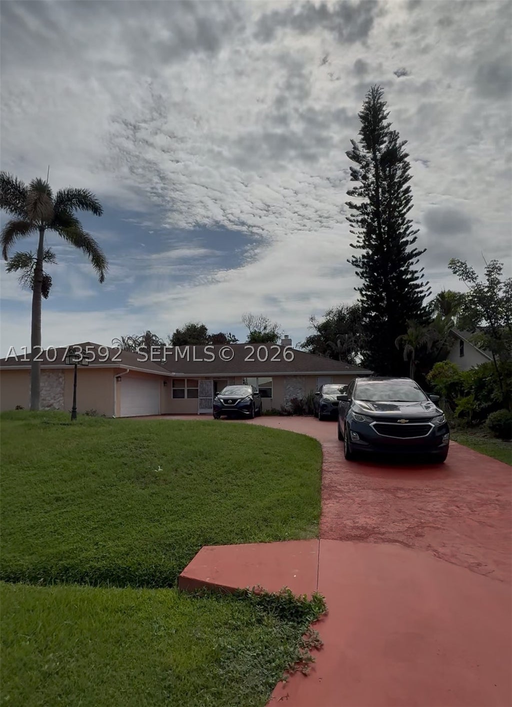 Photo of 1457 SE Ladner St, Port St Lucie, FL 34983 (MLS # A12073592)