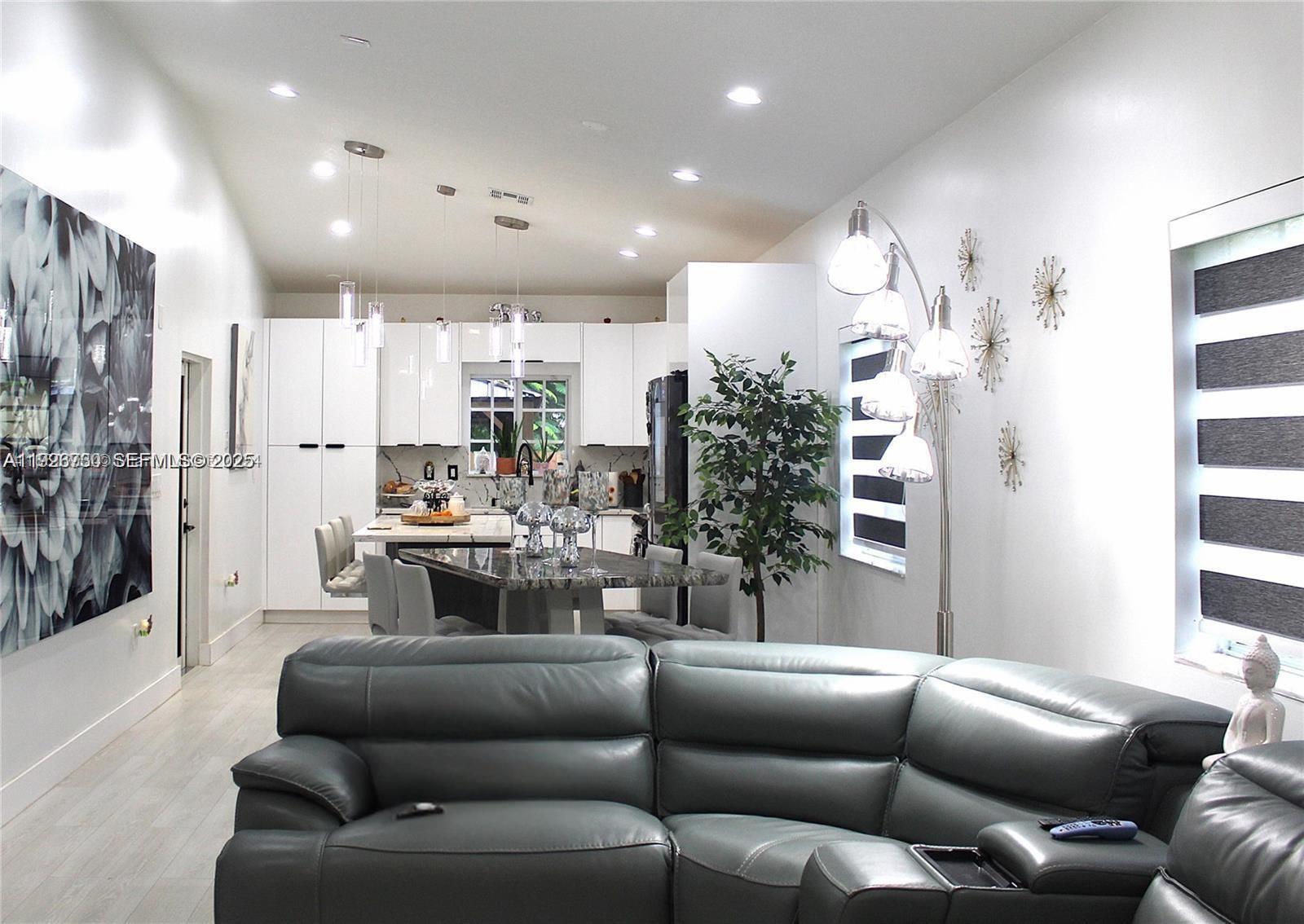 View photos, virtual tours, details... 1209 NE 32nd Ave