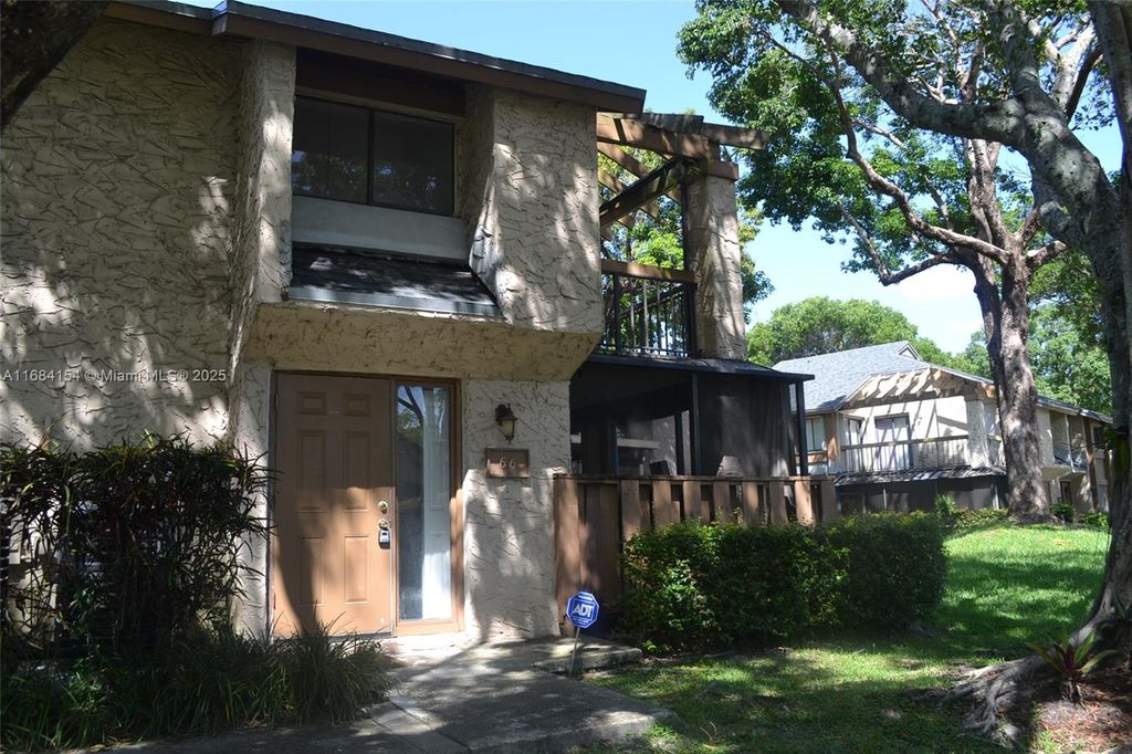Photo of 66 Wimbledon Lake Dr, Plantation, FL 33324 (MLS # A11684154)