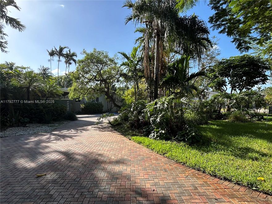 Skylake sophisticated mid-century modern estate! Situated on 1/2 acre lushly landscaped corner property. This expansive home is meticulous and awaits your family. It boasts over 3,000 sq. Ft. Of custom design. The living room enjoys wood vaulted ceilings, fireplace, and wall of glass overlooking a 500 sq ft patio. New gourmet kitchen has top-of-the-line appliances, a breakfast area, and office space. The master suite adjoins the exercise room/office nursery. A huge, secluded backyard with a heated, saltwater pool, and garden area to entertain a crowd. All impact windows and doors, charging station for electric cars, built-ins throughout. This a unique home for a special family. Minutes to the best schools, shopping, fine dining, beaches, I-95, Aventura Mall and brightline station!!