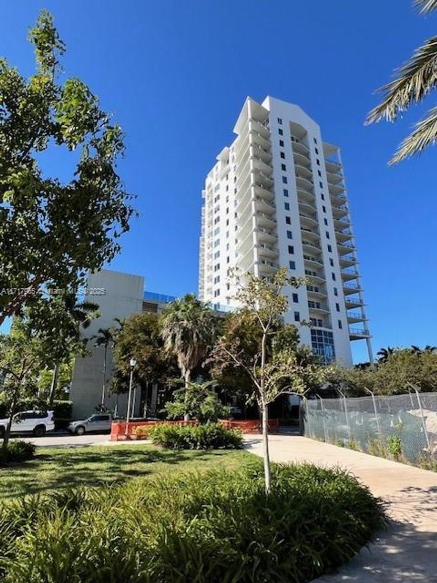Largest 2/2 in the building. Open loft space with 9 foot high ceilings and custom sliding frosted dividers for each bedroom.  Both bathrooms have been beautifully updated. Expansive high impact windows and open balcony. Amazing views of skyline and the Miami River.  Convenient location very close to Brickell, Downtown and I-95. TWO Garage parking spaces! Valet parking for guests, 24 hour concierge, storage unit, infinity edge pool, spa, exercise room, sauna, clubhouse, on site dog park and more.
