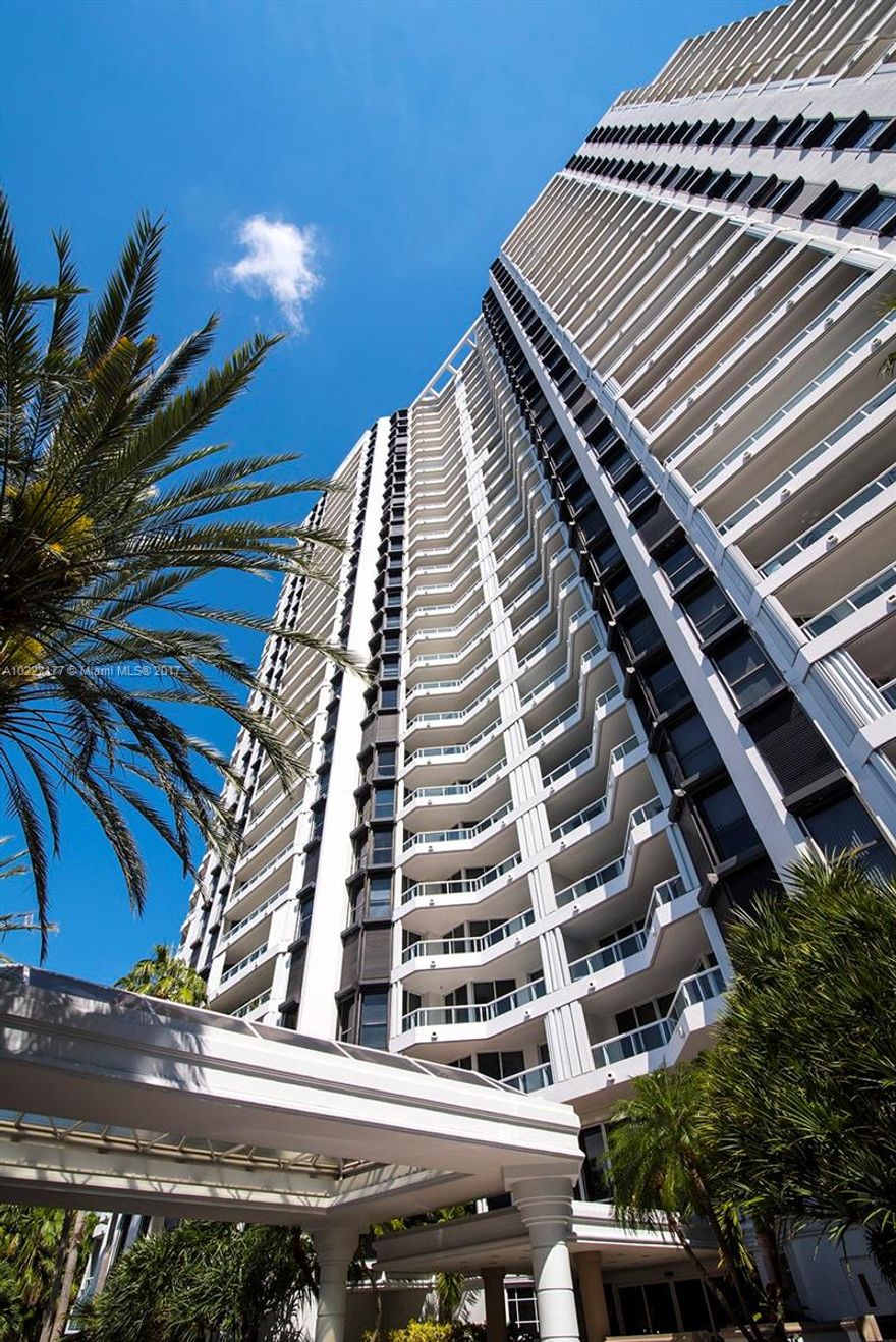 Conveniently situated apartment in The North Tower at The Point. It is at pool level with huge terrace for relaxing, playing or entertaining.  2 bedrooms 2 baths, beautiful floors, very well kept, and  updated modern kitchen. Second bedroom has French doors and can be a Den or office. Washer and Dryer inside the unit.Come and enjoy what The Point has to offer: state of the art gym, 6 pools, spa, valet parking, & best location in Aventura.