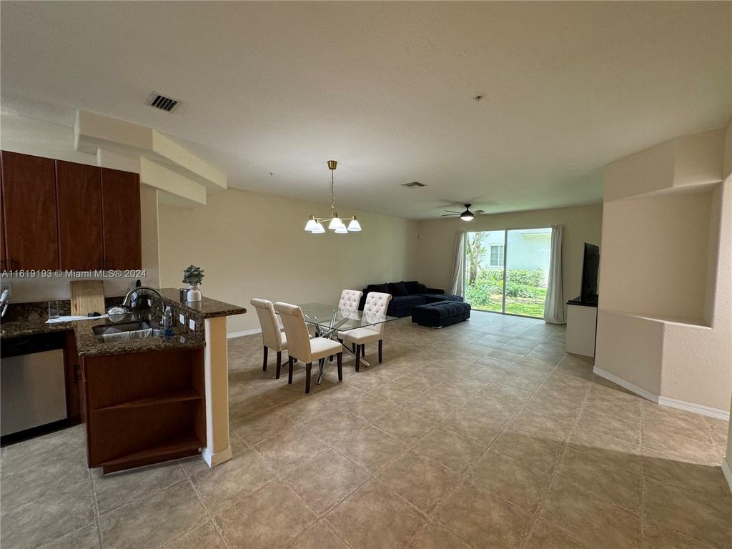 Photo of 12421 SW 50th Ct #309, Miramar, FL 33027 (MLS # A11619193)