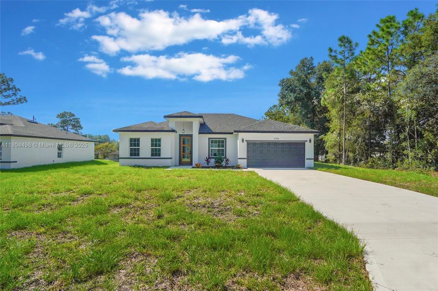 Prime Marion-Oaks Location!!! NO HOA FEE!!! NO CDD FEE!!! Close to great schools, commercial area & restaurants. Just 20 minutes from Rainbow Springs to swim and being in nature. Residence offers 4 bed with walk-in closets and 2 modern bathrooms feature sleek cabinets and functional sinks, expansive cabinetry, & high-quality quartz countertops. The stunning kitchen features sleek 42-inch cabinets, elegant quartz countertops, central island and pantry, kitchen fully equipped with stainless steel appliances, stove, refrigerator, garbage disposal, dishwasher, and microwave. Additional highlights include laundry room & a spacious attached garage for two cars, with swinging gate offering security and convenience. Home is equipped with Safety Zone Water Systems for your water treatment.