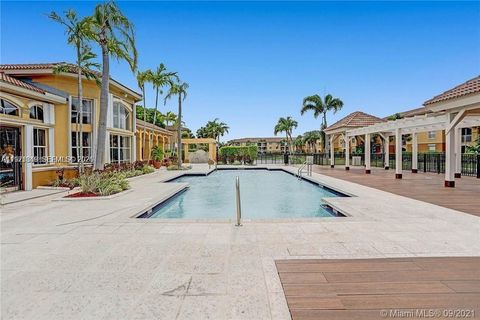 Photo of 9640 NW 2nd St #5-105, Pembroke Pines, FL 33024 (MLS # A11971349)