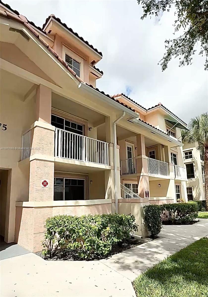 Beautiful one bedroom and one bathroom condo, freshly painted in a neutral color with brand new wood laminate floors, modern light fixtures, and a new refrigerator. The spacious bedroom offers excellent storage, while the kitchen features granite countertops, stainless steel appliances, and abundant cabinet space. Enjoy two porches, one in the front and another in the back, perfect for relaxing outdoors. Conveniently located on the first floor with easy access, this residence combines comfort and functionality. Situated in the heart of Abacoa Village, surrounded by restaurants, retail, and services, and only five minutes from I-95 and Jupiter Beach, this home offers an ideal lifestyle in a highly desirable location.