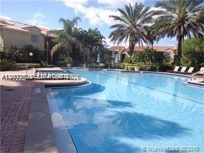 Photo of 1267 SW 46th Ave #2315, Pompano Beach, FL 33069 (MLS # A12077523)