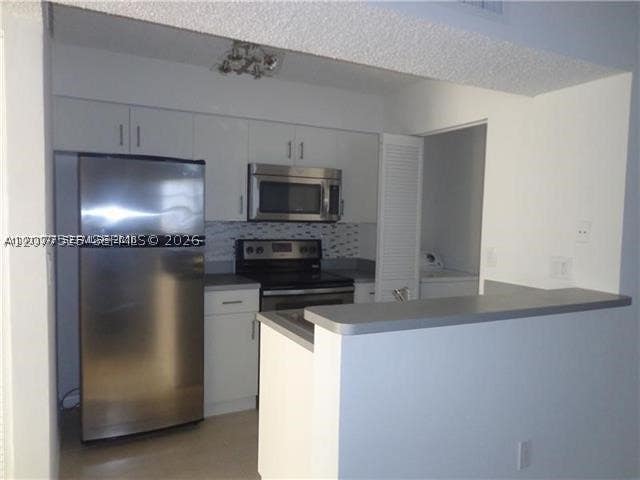 Photo of 1267 SW 46th Ave #2315, Pompano Beach, FL 33069 (MLS # A12077523)