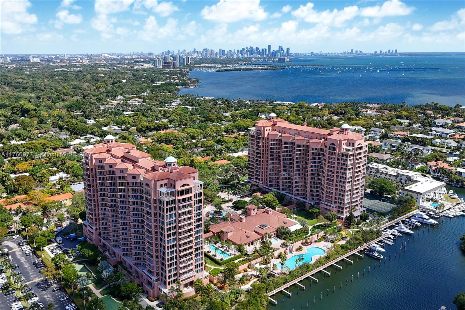 Discover the pinnacle of luxurious living at the highly sought-after Gables Club! This remarkable property offers a resort-like ambiance and a stunning waterfront location, making it an exceptional choice. It also provides premium services, including concierge support, extensive security, valet parking, a lively clubhouse, a refreshing spa, a salon, a fully equipped fitness center, heated swimming pools, tennis courts, and much more. Upon entering your 3,100-square-foot condo, you'll discover an inviting living room & eat-in kitchen equipped with everything you need. The spacious primary suite features two baths, two additional beds, baths + an additional room as a den or office, etc. Located in a prime area, you'll be just 10 mins from downtown Gables, Grove, & South Miami.