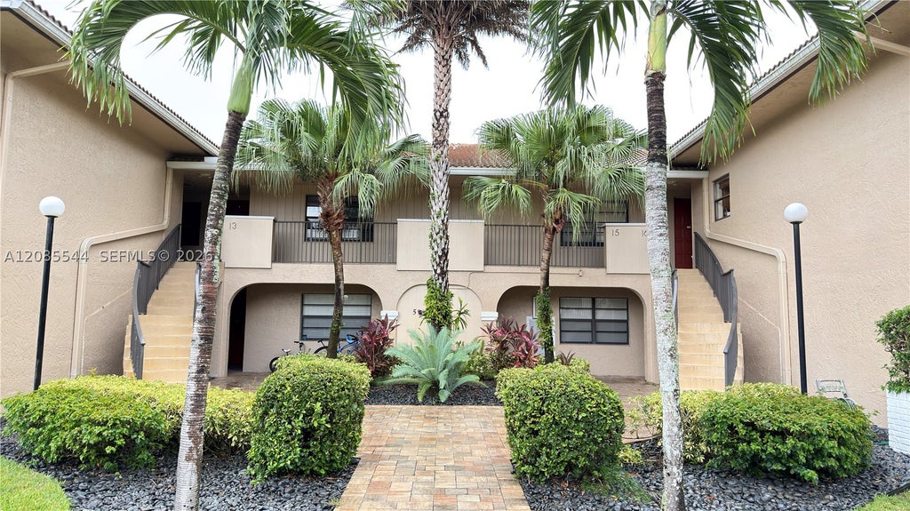 Photo of 400 NW 127th Ave #16, Plantation, FL 33325 (MLS # A12085544)