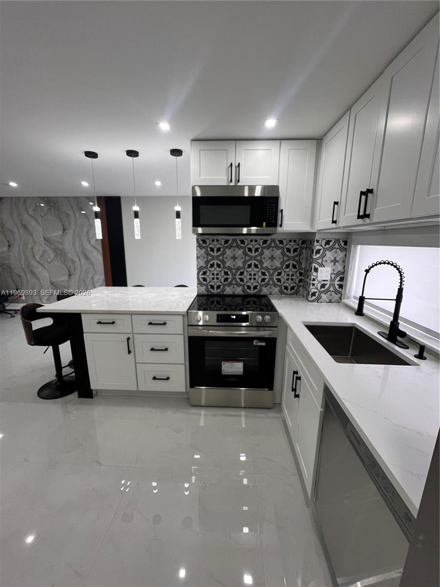 PLAZA OF AMERICAS CONDO P - Residential