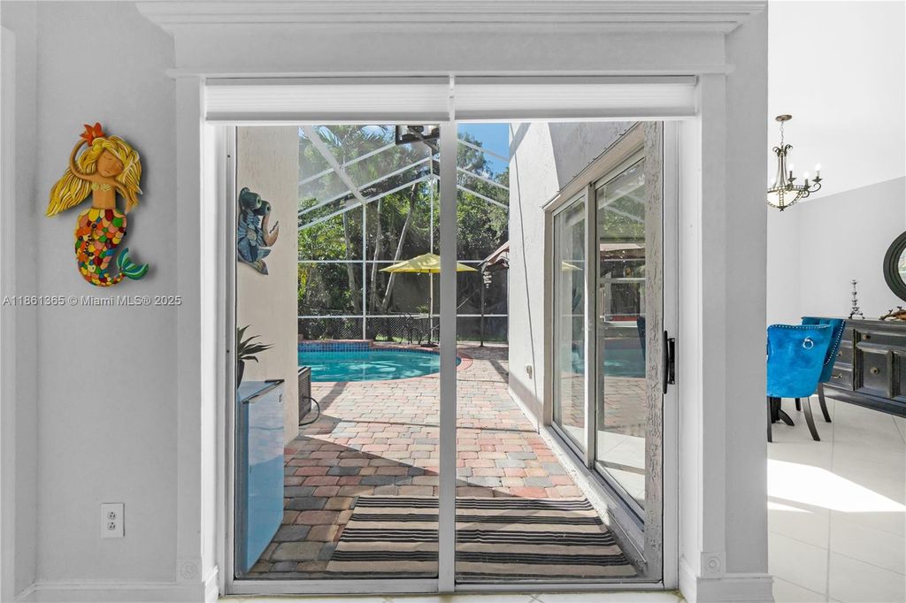 Photo of 491 SW 203rd Ave, Pembroke Pines, FL 33029 (MLS # A11861365)