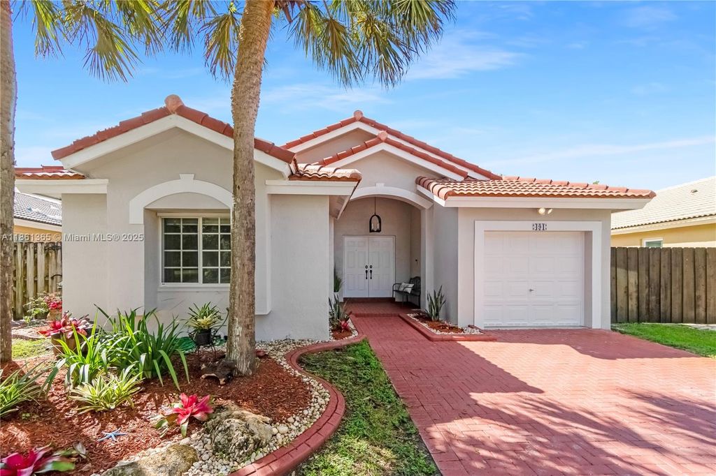 Photo of 491 SW 203rd Ave, Pembroke Pines, FL 33029 (MLS # A11861365)