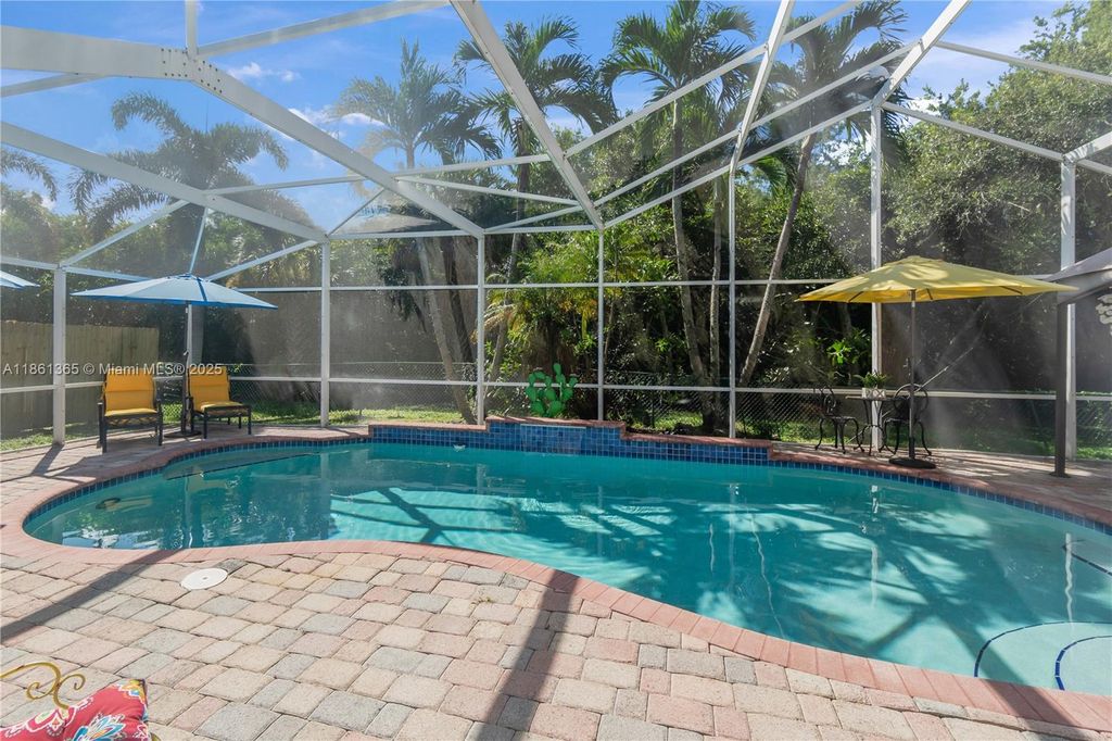 Photo of 491 SW 203rd Ave, Pembroke Pines, FL 33029 (MLS # A11861365)