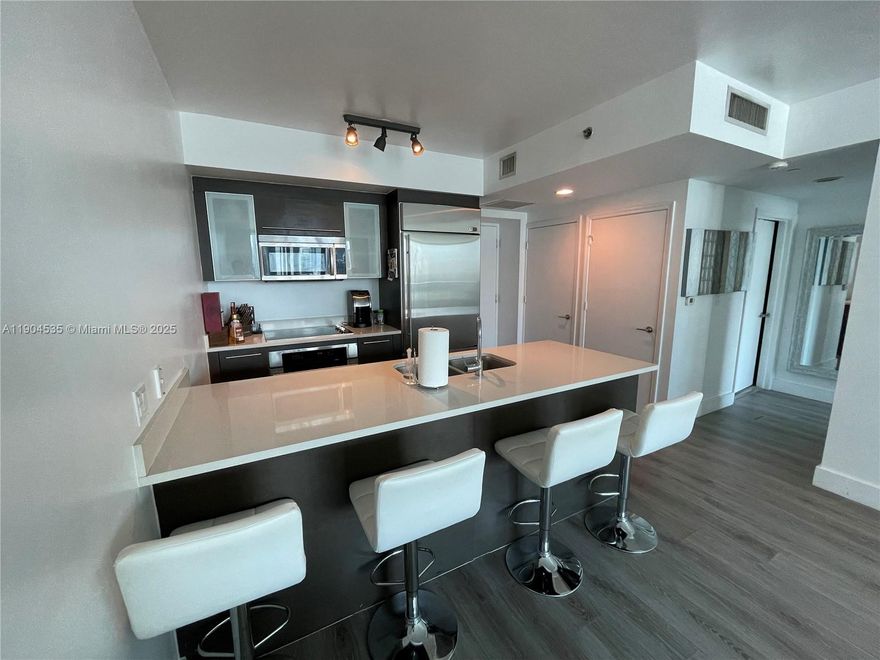 1 BR - 1 BA 738 SQ/FT - FURNISHED APARTMENT AT 500 BRICKELL WEST TOWER, Live in the heart of Brickell’s Financial District, just one block from Brickell City Centre. This beautifully furnished unit features stunning city and Biscayne Bay views, granite countertops, vinyl flooring, stainless steel appliances, a European-style kitchen, and a spacious balcony. Enjoy walking distance to Mary Brickell Village, top-rated restaurants, shops, and Miami’s best attractions. 500 Brickell offers resort-style amenities, including two pools (one infinity-edge), a hot tub, fitness center, theater room, party, 24-hour concierge, valet, and security.
