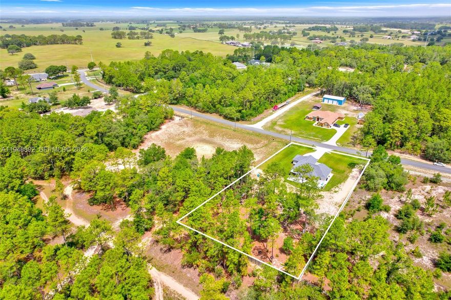 Stunning new construction in the desirable Rolling Hills community of Ocala! Set on a generous 1.5-acre lot, this thoughtfully designed 3-bedroom, 2-bath home offers modern comfort with space and privacy rarely found. The open-concept layout features high ceilings, abundant natural light, and a seamless flow ideal for everyday living and entertaining.
The kitchen is beautifully finished with granite countertops, quality cabinetry, and ample storage. The spacious primary suite serves as a private retreat with a walk-in closet and a well-appointed en-suite bath. Secondary bedrooms offer flexibility for guests, a home office, or additional living space.
Enjoy the freedom of no HOA and expansive outdoor potential—perfect for future enhancements, recreation, or simply relaxing in a peaceful setting. Conveniently located near shopping, dining, medical facilities, and Ocala’s renowned equestrian venues, this home delivers the ideal balance of privacy and accessibility.
Move-in ready, brand new, and built for modern Florida living—an exceptional opportunity in Rolling Hills.