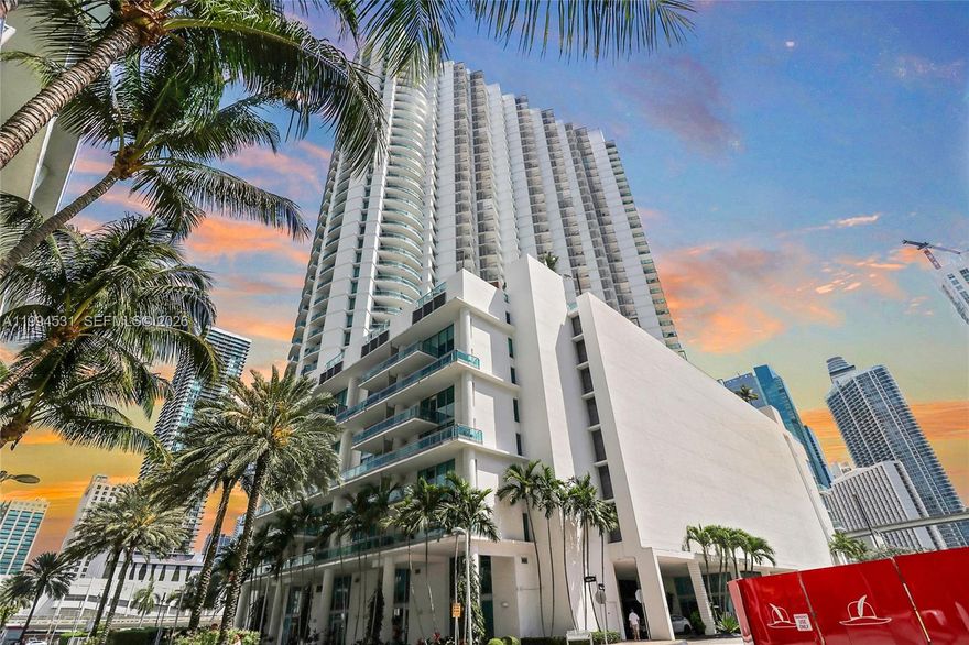 Rare opportunity to own the highest penthouse line at Wind Brickell. This 1 Bed/1 Bath residence offers 740 Sq ft of well-designed living space with panoramic views of the Brickell skyline, Biscayne Bay, and the Miami River from every room and your private balcony. 
The open living and dining area connects to a dedicated multimedia space, ideal for a home office or entertainment room. Ceramic floors throughout and a layout that captures natural light all day. 
Wind Brickell offers resort-style amenities: two pools, jacuzzi, sauna, steam room, two-story fitness center, racquetball court, game room, sports lounge, screening room, party room, and children's playroom. One assigned covered parking space included. This penthouse sits next to the future site of Faena Residences, one of Miami's most anticipated architectural landmarks. A project of that scale will strengthen property values, elevate the surrounding community, and drive long-term appreciation for neighboring residences. Wind residents will enjoy an iconic building as a neighbor while this penthouse retains its skyline views. Steps from Brickell City Centre, dining, and nightlife.