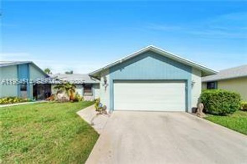 Photo of 9141 SW 22nd St, Boca Raton, FL 33428 (MLS # A11954514)