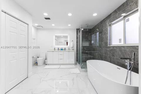 Tiny photo for 1240 NE 159th St, North Miami Beach, FL 33162 (MLS # A12047701)