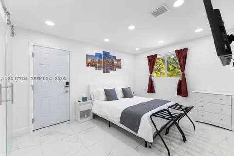 Tiny photo for 1240 NE 159th St, North Miami Beach, FL 33162 (MLS # A12047701)