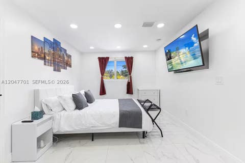 Tiny photo for 1240 NE 159th St, North Miami Beach, FL 33162 (MLS # A12047701)