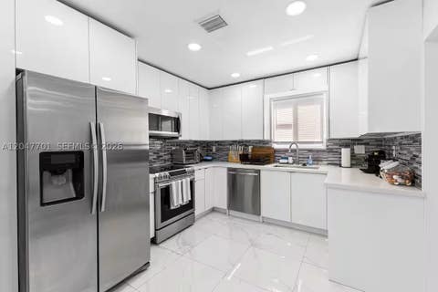 Tiny photo for 1240 NE 159th St, North Miami Beach, FL 33162 (MLS # A12047701)