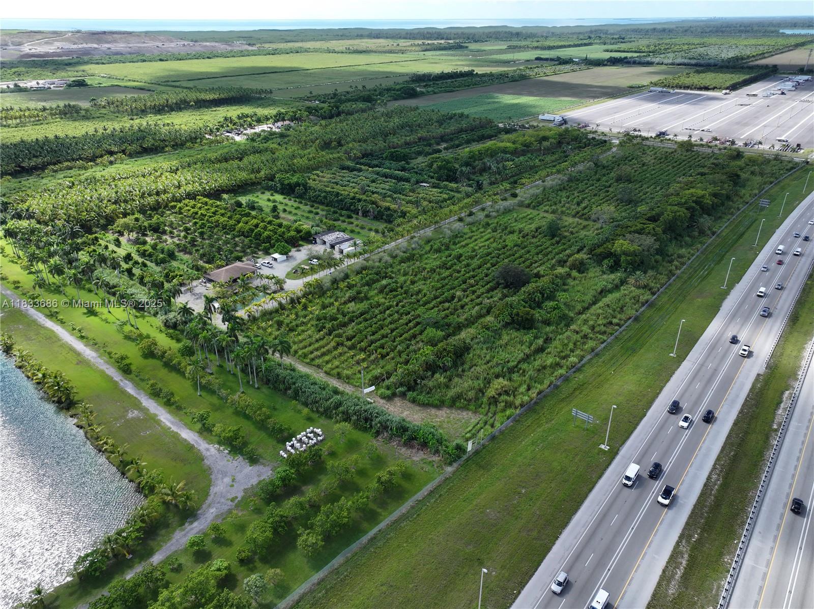 Rare opportunity featuring 39.73 acres of prime agricultural land in South Miami-Dade County, consisting of five contiguous parcels (30-6020-000-0300, 30-6020-000-0040, 30-6020-000-0011, 30-6020-000-0012, 30-6020-000-0320).
Access through gated entrance 10301 SW 240th St.
The property has electricity, water & also includes a residential duplex, office, storage & utility buildings. Zoned AU, the property supports a wide range of uses (see Miami-Dade zoning code for permitted uses). Commercial Truck parking is permitted on these parcels. Its visibility & proximity to the FL Turnpike enhances its appeal.
Adjacent and nearby parcels are also available, providing buyers with the option to assemble additional acreage and expand their footprint in this strategic South Miami-Dade location.