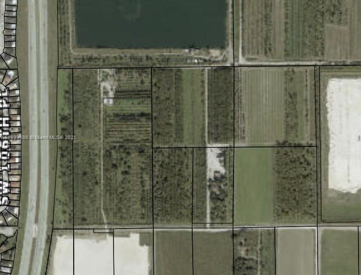 Rare opportunity featuring 39.73 acres of prime agricultural land in South Miami-Dade County, consisting of five contiguous parcels (30-6020-000-0300, 30-6020-000-0040, 30-6020-000-0011, 30-6020-000-0012, 30-6020-000-0320).
Access through gated entrance at 10301 SW 240th Street.
The property has electricity, water & irrigation & also includes a residential duplex, office, storage & utility buildings. Zoned AU, the property supports a wide range of uses (see Miami-Dade zoning code for permitted uses). Its visibility & proximity to the FL Turnpike enhances its appeal.
Adjacent and nearby parcels are also available, providing buyers with the option to assemble additional acreage and expand their footprint in this strategic South Miami-Dade location.
